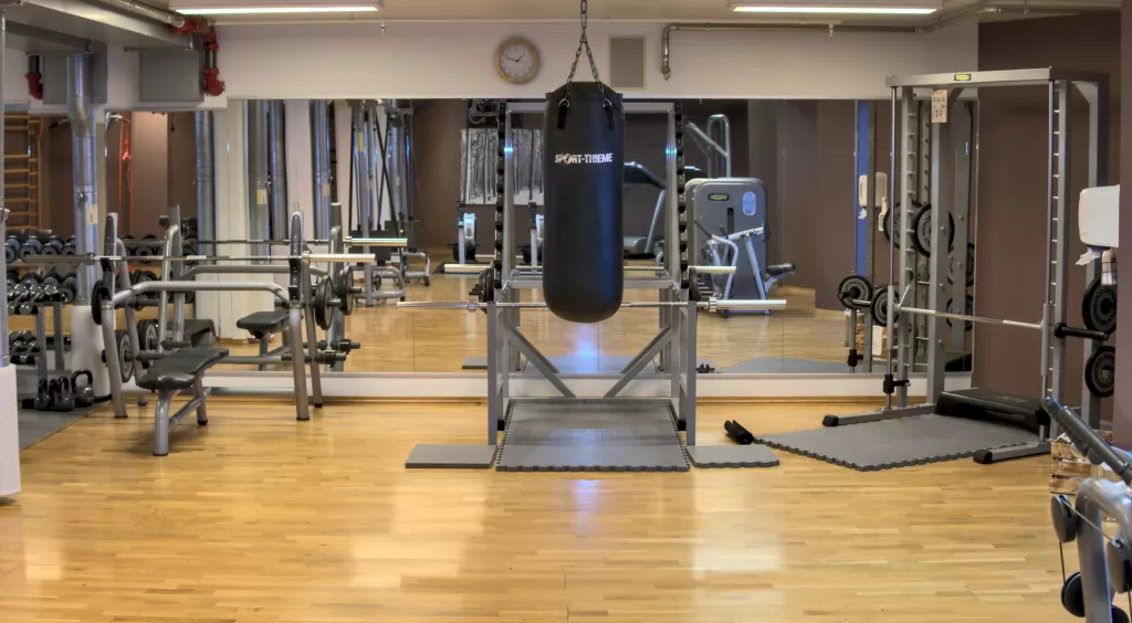 Fully equipped training room with boxing bag