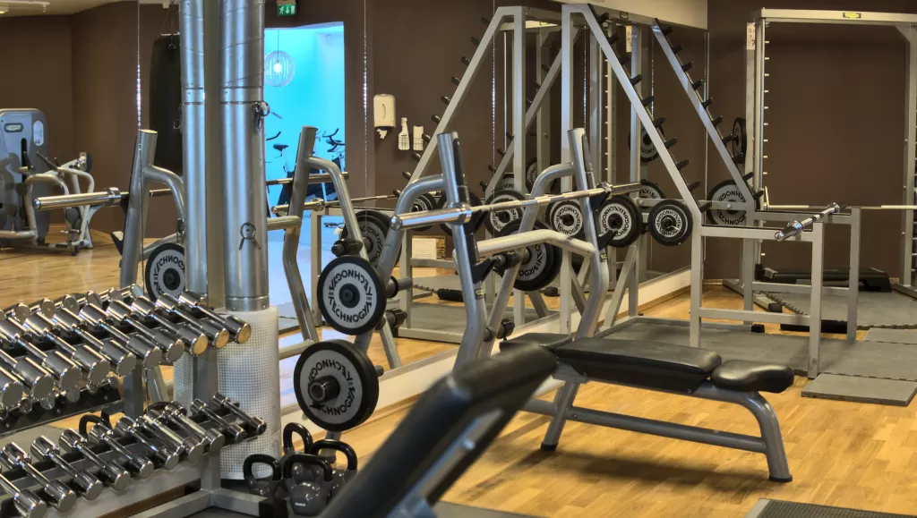 Fully equipped gym with a variety of dumbbells 