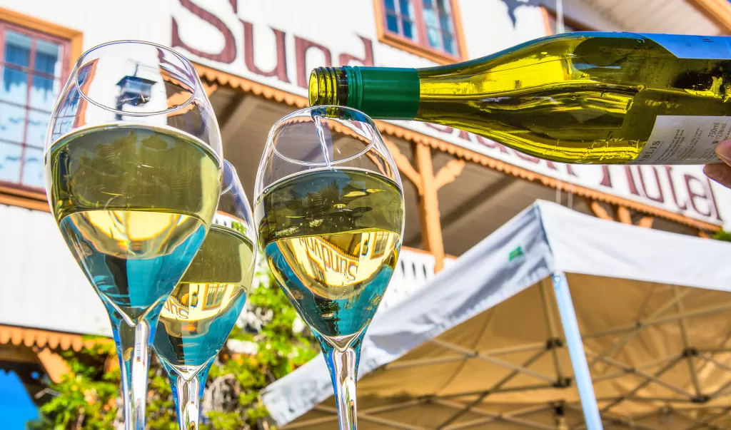 Enjoy a delicious glass of wine under the spring sun